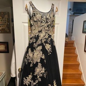 Dress purchases at Saks Fifth Avenue worn once. Size 2 by Basix